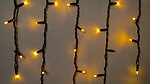 Фото Delux Icicle 75 LED 2x0.7 м черный/желтый flash IP44 EN (90020891)