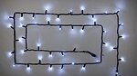 Фото Delux String 100 LED 2x5 м черний/белый flash IP44 EN (90020900)
