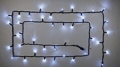 Фото Delux String 100 LED 2x5 м черний/белый flash IP44 EN (90020900)