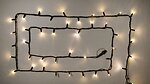 Фото Delux String 100 LED 2x5 м черный/теплый белый flash IP44 EN (90020903)